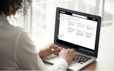 Woman typing on laptop to access her HD Supply My Account