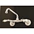 Kingston Brass Adjustable Center Porcelain 2-Handle Wall-Mount Standard Kitchen Faucet in Chrome