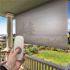 SeaSun Tide Pool Grey and Black Motorized Outdoor Patio Roller Shade with Valance 72 in. W x 96 in. L