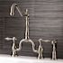 Kingston Brass Tudor 2-Handle Bridge Kitchen Faucet with Side Sprayer in Brushed Nickel