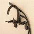 Kingston Brass Modern Adjustable 3-Handle Wall-Mount Claw Foot Tub Faucet with Handshower in Oil Rubbed Bronze