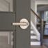 Kwikset Milan Satin Nickel Keyed Entry Door Lever featuring SmartKey Security