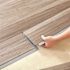 TrafficMaster Dove Maple 4 MIL x 6 in. W x 36 in. L Grip Strip Water Resistant Luxury Vinyl Plank Flooring (24 sqft/case)