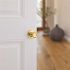 Kwikset Tylo Polished Brass Bed/Bath Door Knob