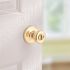 Kwikset Tylo Polished Brass Bed/Bath Door Knob