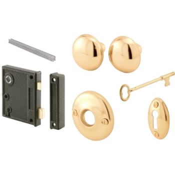 Image for Defender Security Vertical Trim Lock Set, 2-1/2in, Cast Stl, Brass Knobs from HD Supply