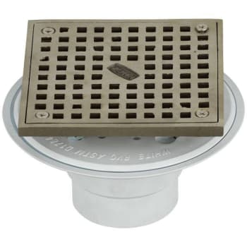 Image for Zurn 2" Cast Iron Pushon Shower Drain 4" Square Polished Brass Top from HD Supply